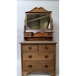 An early 20th century pine dressing table, with a detachable mirror, with brass drop handles,