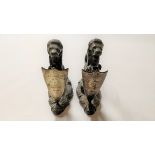 A pair of plated spill or bud vases, modelled as lions rampant holding a shield with a