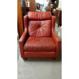 A 1970's red leather armchair by Minty & Co