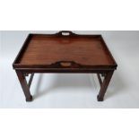 An Edwardian fitted mahogany butlers tray on stand, 50cm high, 80cm long, 53cm deep