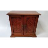 A 20th century wooden collectors cabinet, the inside section fitted with six small drawers, 50cm