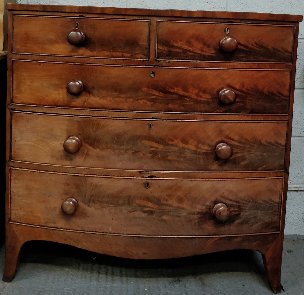 A Victorian mahogany chest of drawers of two short and three long, on bracket feet, 104cm high,