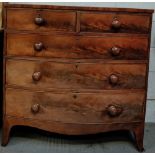 A Victorian mahogany chest of drawers of two short and three long, on bracket feet, 104cm high,