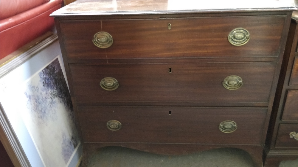 A 19th century mahogany chest of drawers, of three long, with original oval brass handles, 81cm