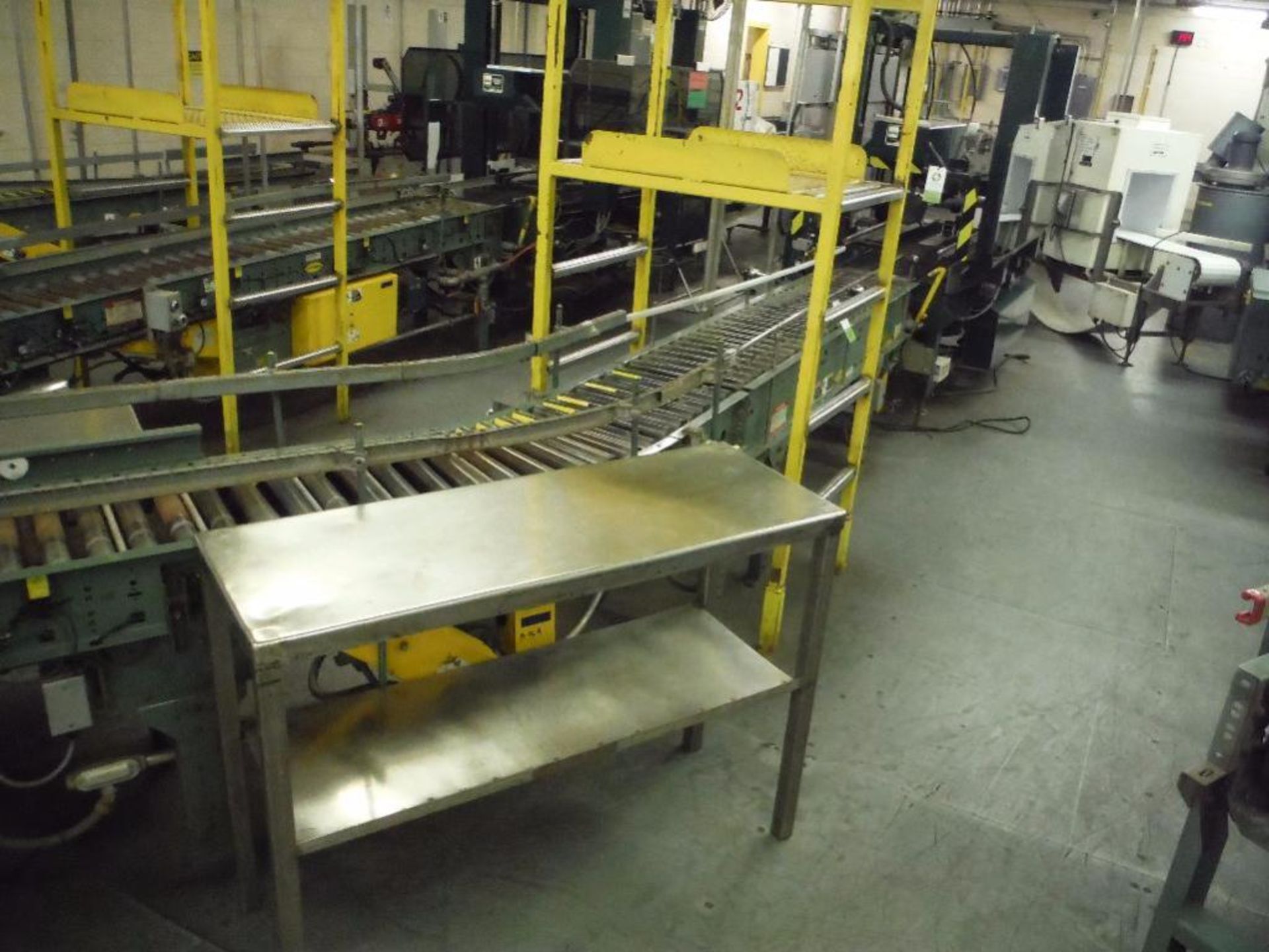 Hytrol 45 degree powered roller conveyor, 11 ft. long x 15 in. wide, motor and drive, mild steel