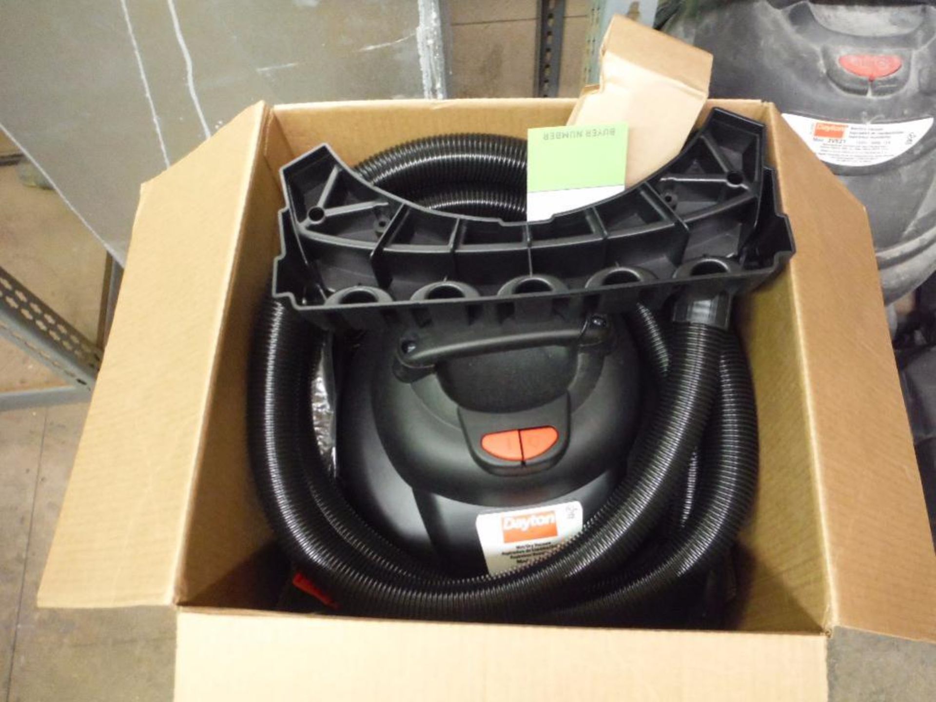 Contents of 1 sections of shelving, new in box Dayton shop vac, multiple used shop vacs ** Rigging - Image 2 of 12