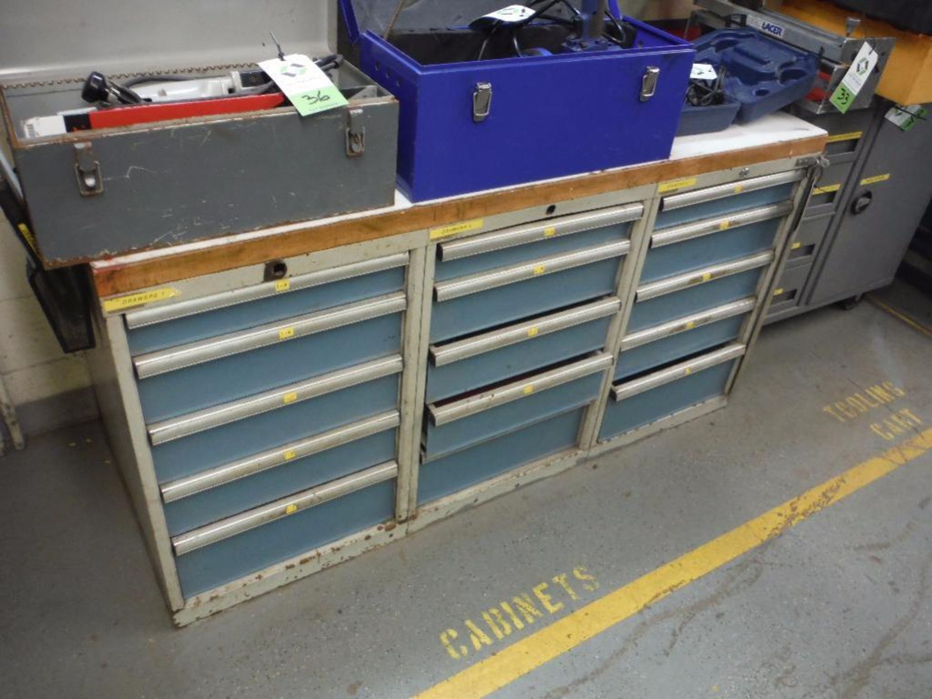(3) 5 drawer cabinets, 22 in. long x 29 in. deep x 34 in. tall, with bench top, and contents, some