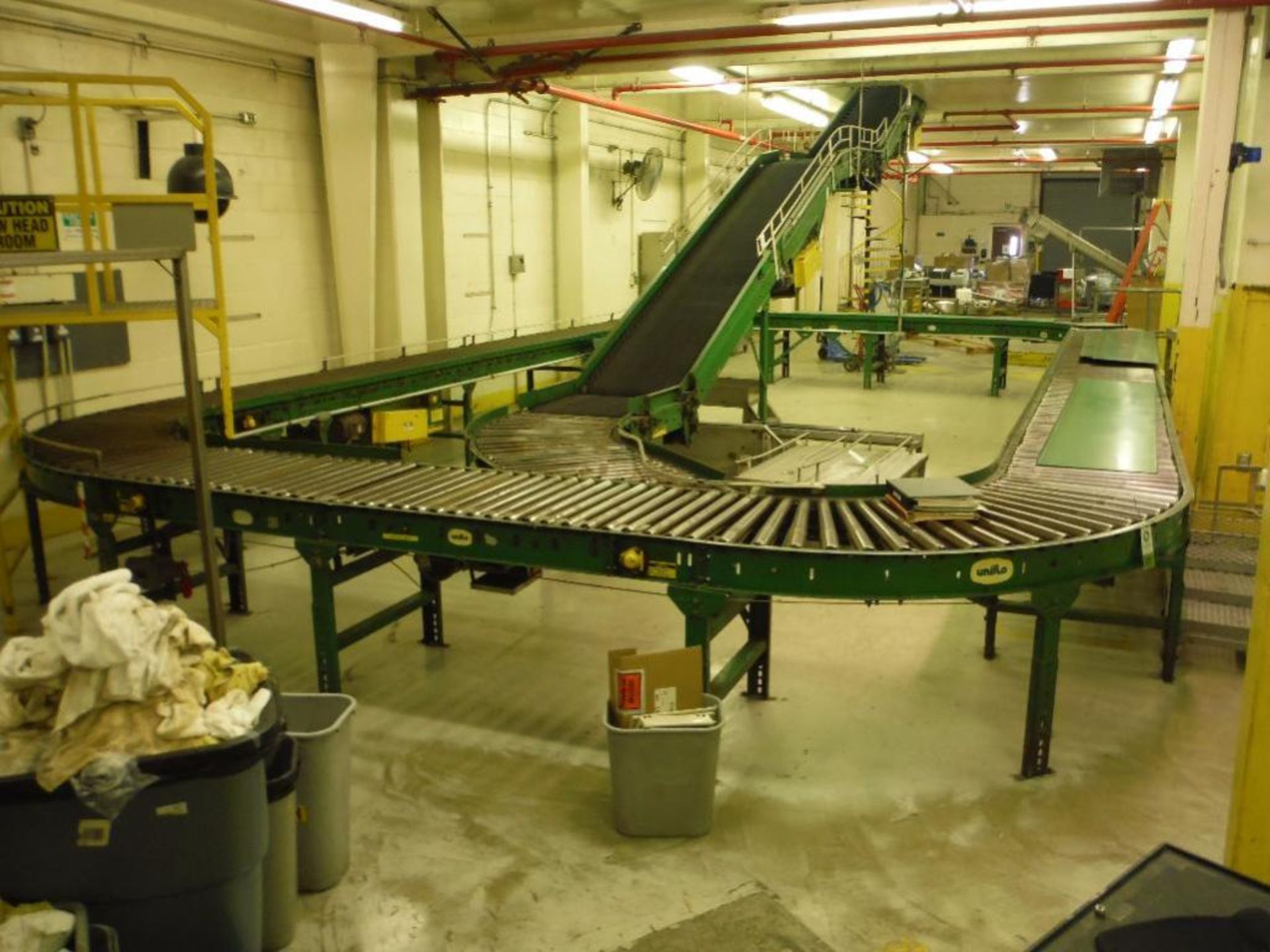 Uniflo 360 degree accumulation and packoff powered roller conveyor, 72 ft. of straight, (4) 90