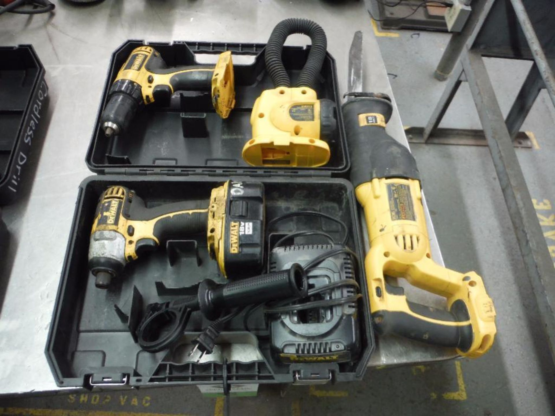 Dewalt 18 volt impact driver, drill, sawzall, light, battery, battery charger, case ** Rigging