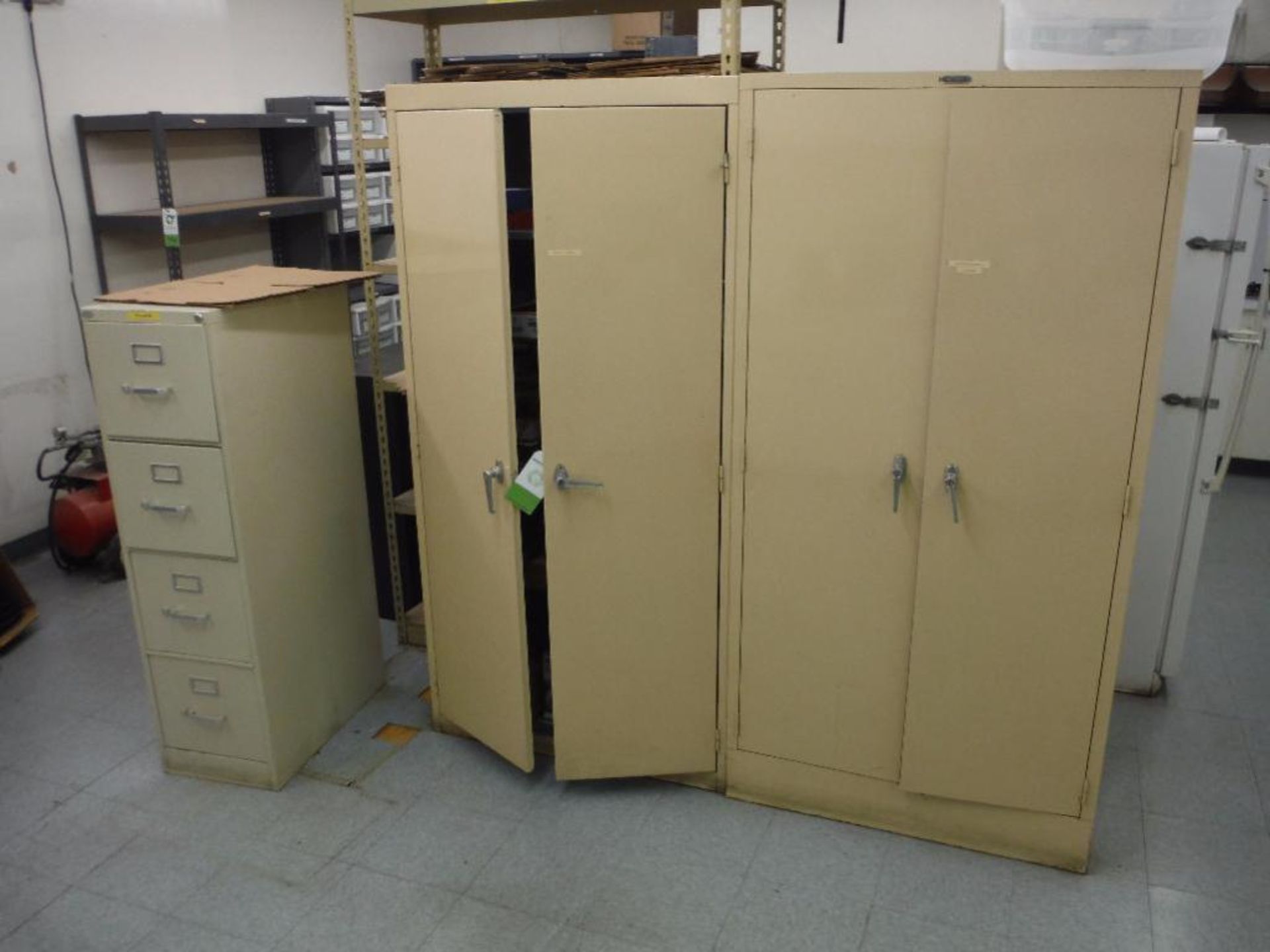 2 drawer filing cabinet, (2) 2-door cabinets and contents, misc. office supplies ** Rigging Fee: $50