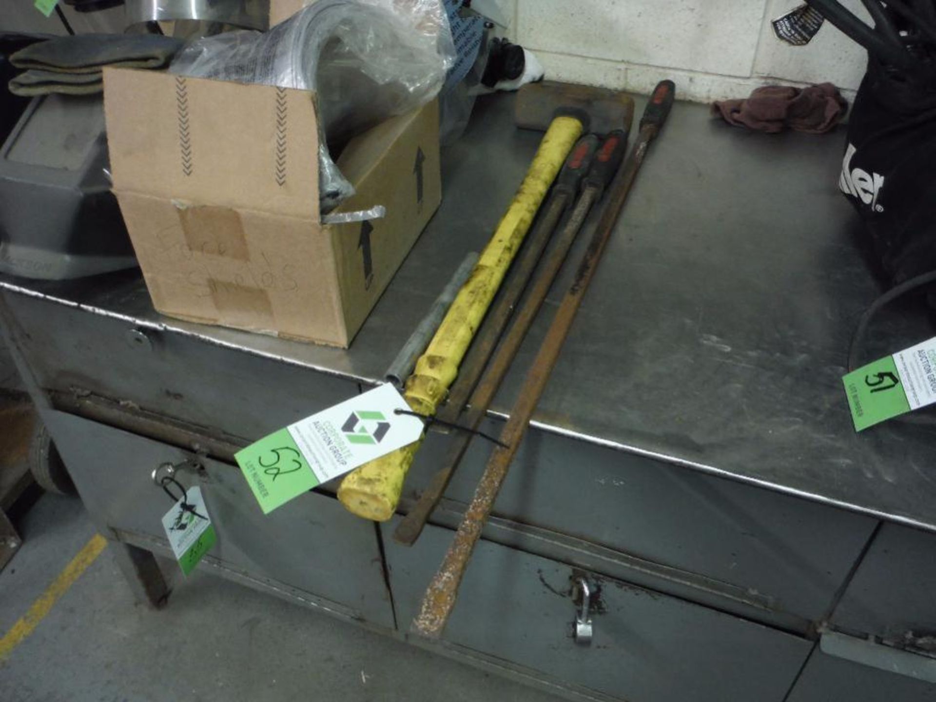 Sledge hammer and assorted pry bars ** Rigging Fee: $5 **