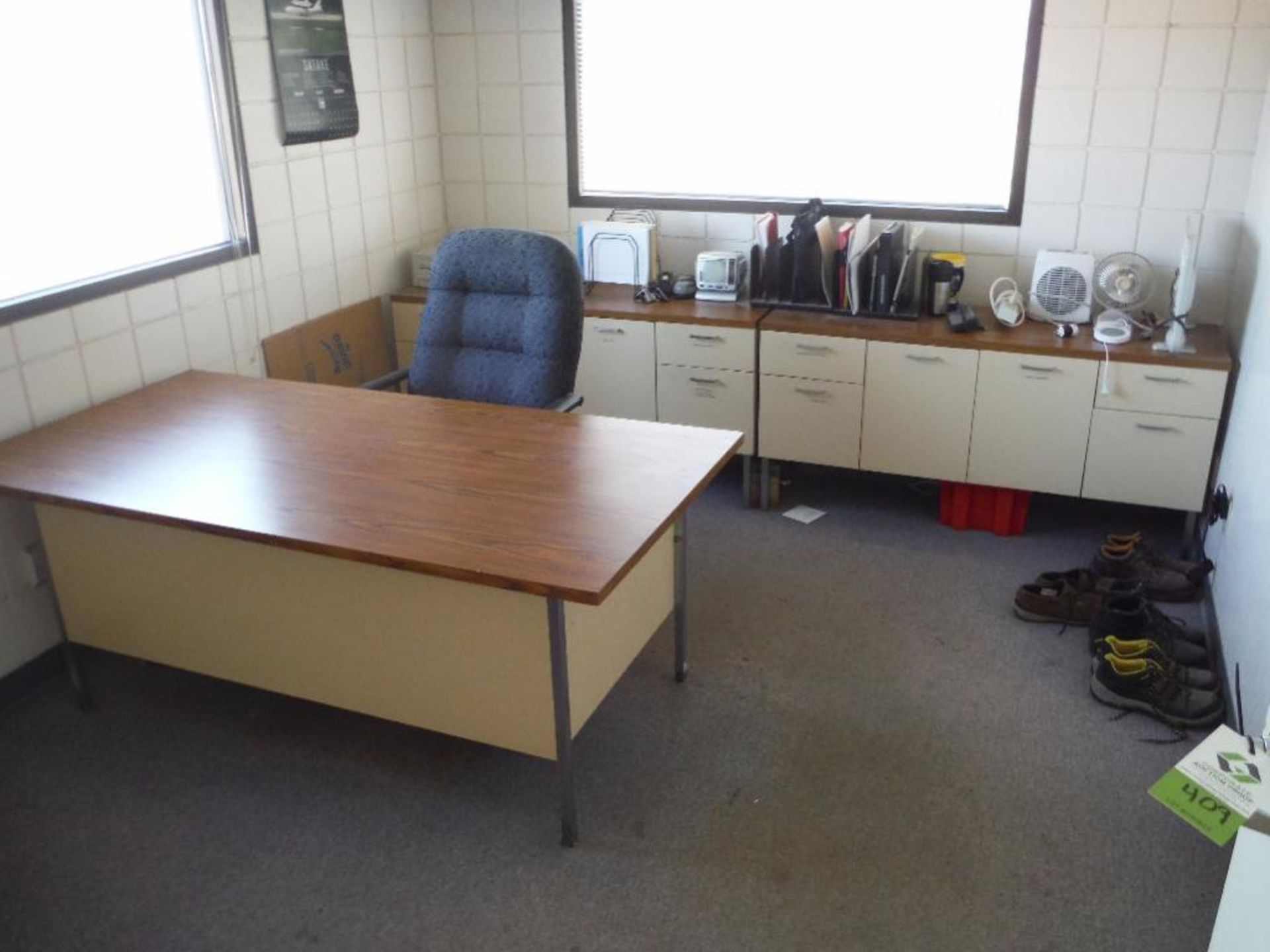 Contents of office, desk, 2 credenzas, 3 chairs, supplies ** Rigging Fee: $250 **