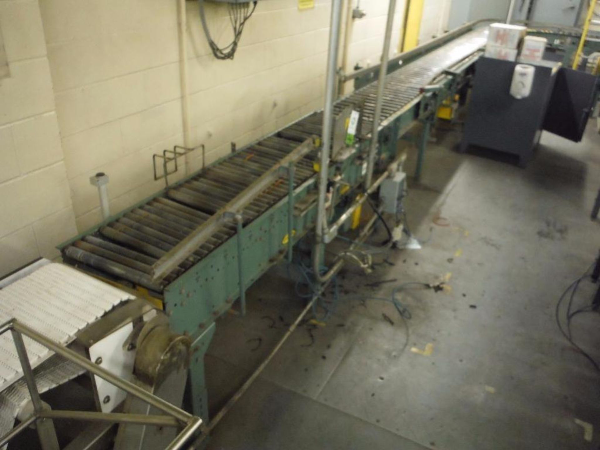 Hytrol powered roller conveyor, 126 ft. long x 15 in. wide, with (2) 90 degree turns, motors and