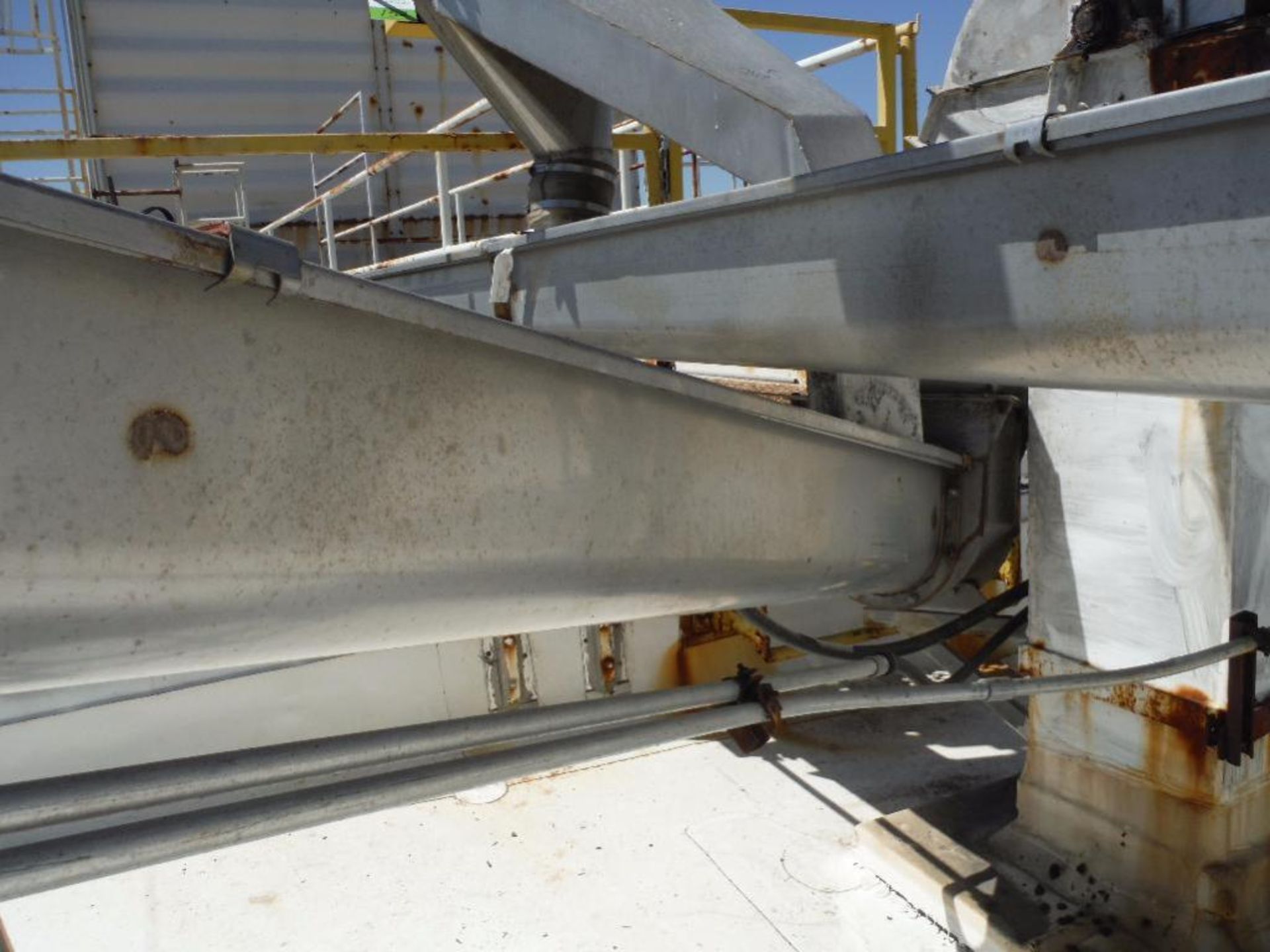 Superflo chain paddle conveyor, 32 ft. long x 6 in. dia ** Rigging Fee: $750 **