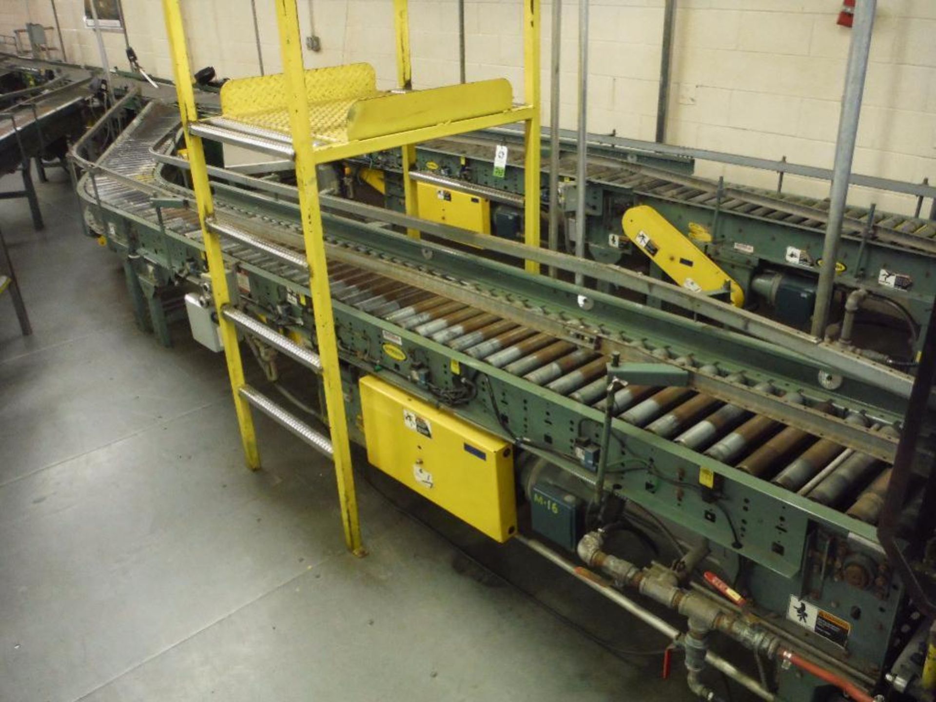 Hytrol 45 degree powered roller conveyor, 24 ft. long x 15 in. wide, motor and drive, mild steel