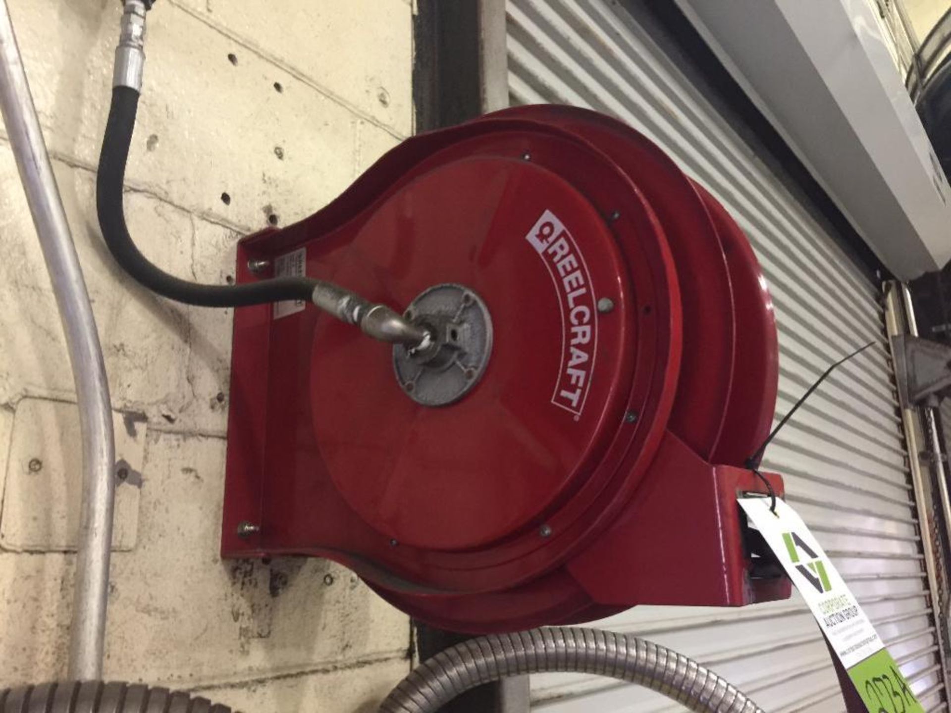 Reelcraft retractable hose reel, with air hose ** Rigging Fee: $15 ** - Image 2 of 3