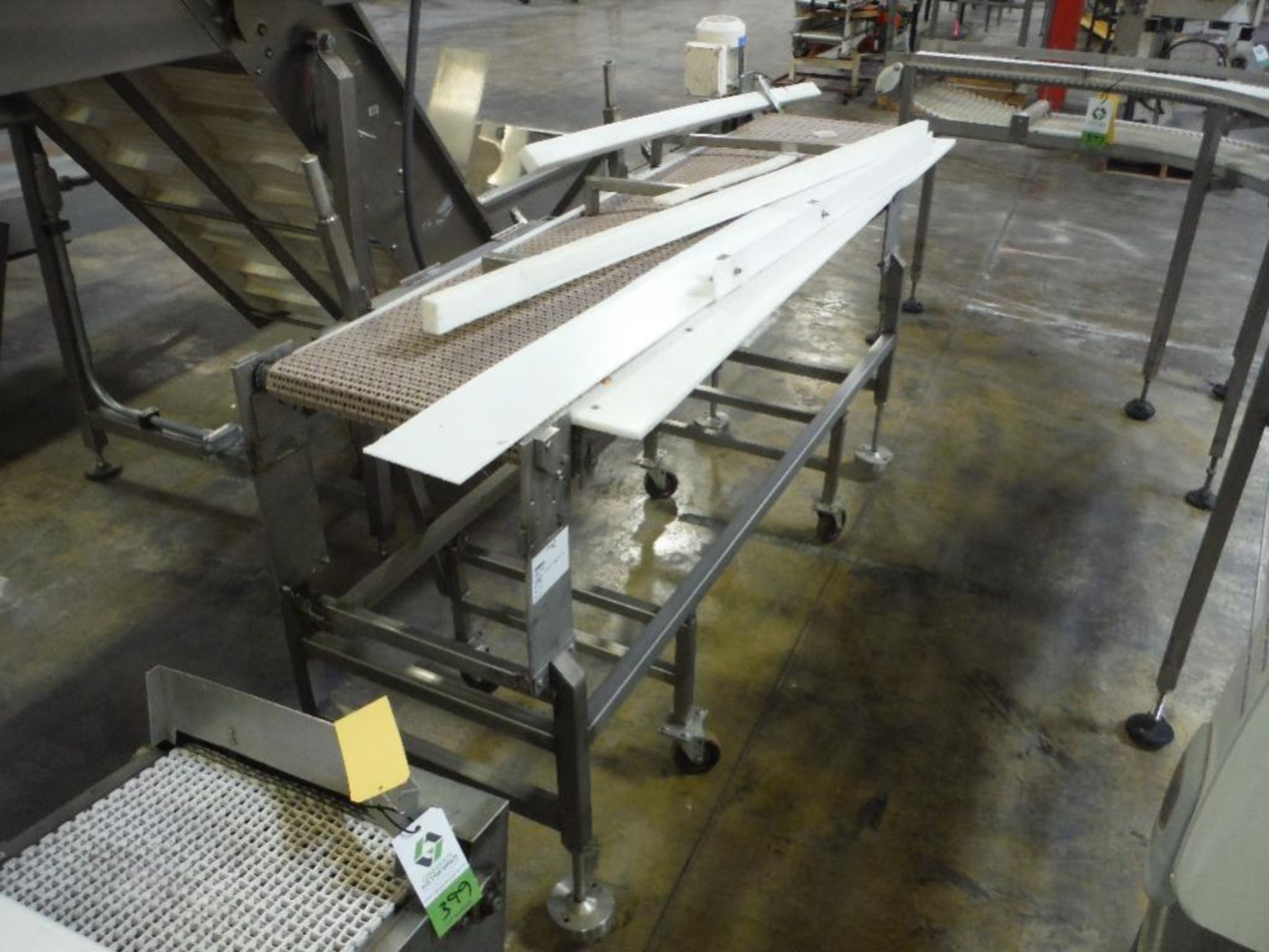 Belt conveyor, 84 in. long x 18 in. wide x 40 in. tall, motor and drive, SS frame, on wheels ** Rigg