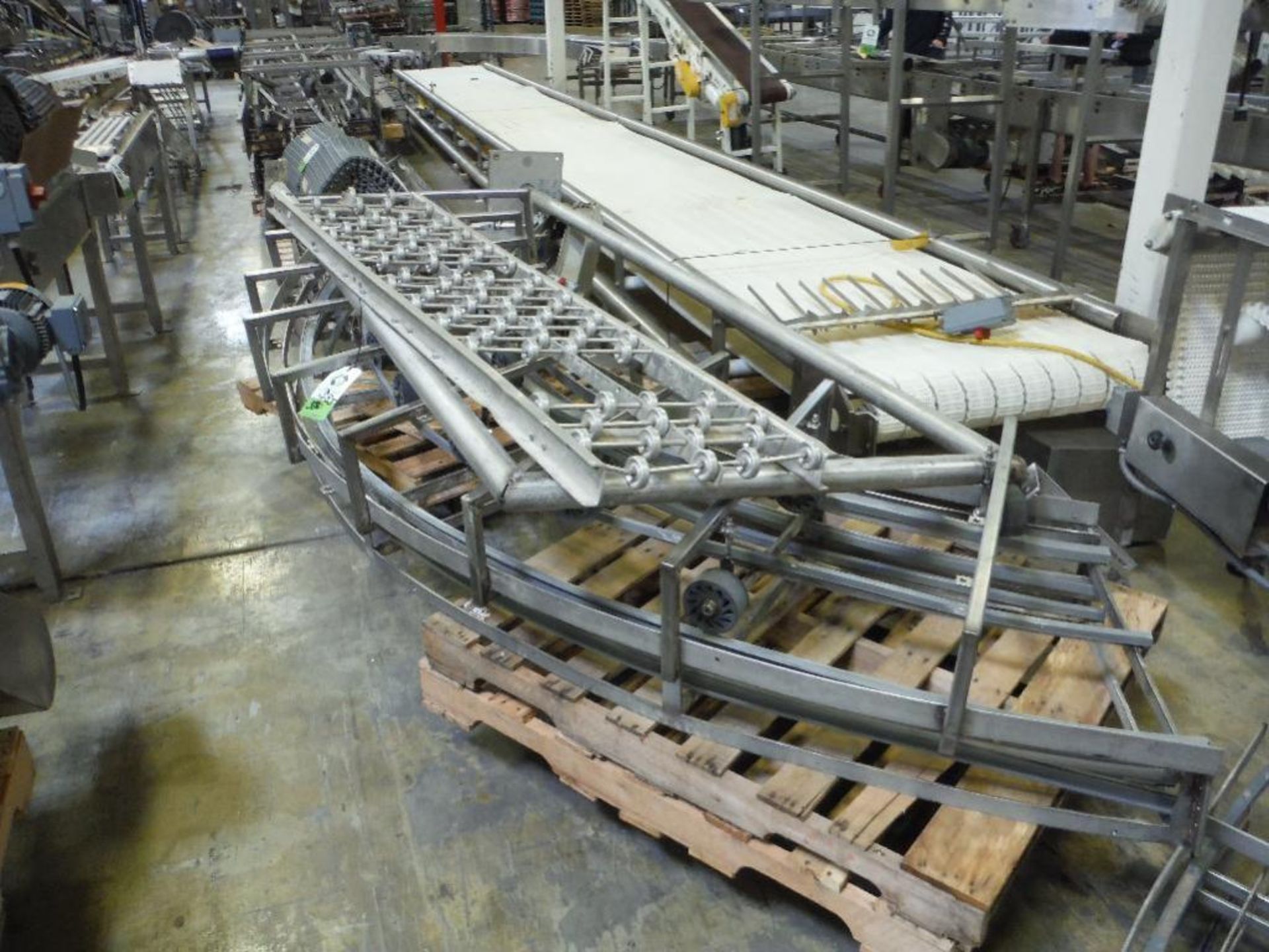 SS conveyor bed, approx. 90 ft. long, 3 rolls of 25 in. wide grey belt, 3 motors and drives, ** Rigg - Image 3 of 14