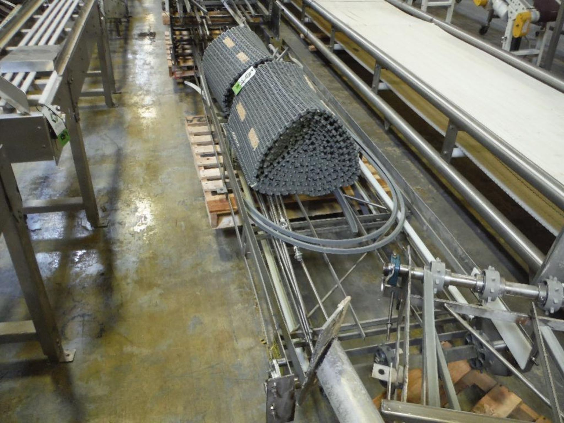 SS conveyor bed, approx. 90 ft. long, 3 rolls of 25 in. wide grey belt, 3 motors and drives, ** Rigg - Image 5 of 14