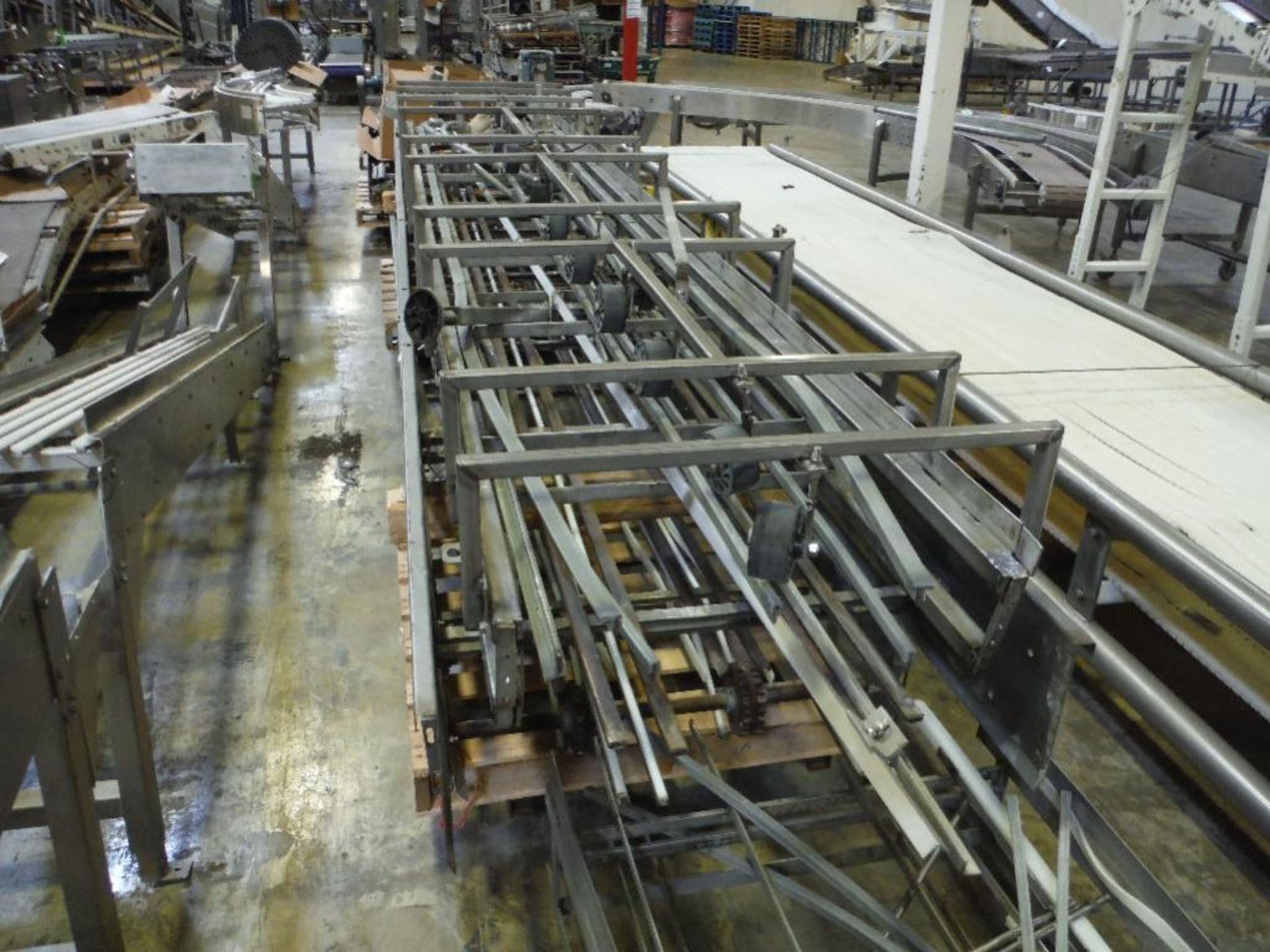 SS conveyor bed, approx. 90 ft. long, 3 rolls of 25 in. wide grey belt, 3 motors and drives, ** Rigg - Image 7 of 14