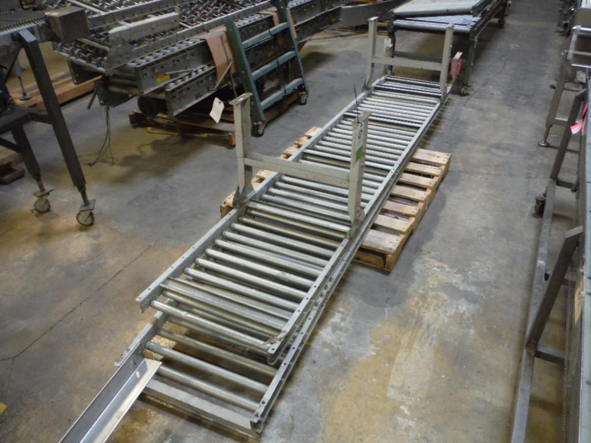 Gravity roller conveyor, 40 ft. long x 18 in. to 26 in. wide, carbon steel ** Rigging Fee: $150 **