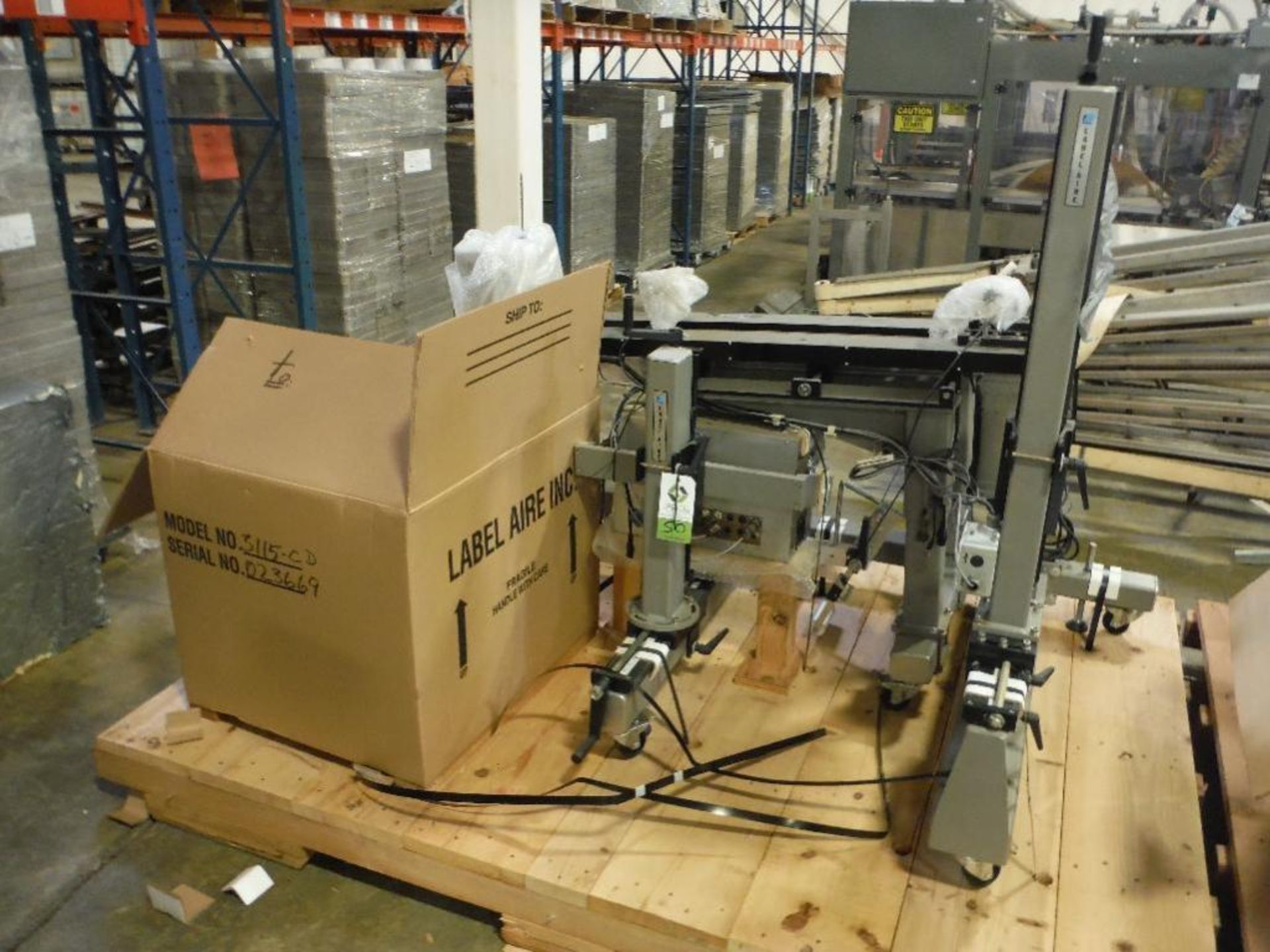 Unused Label-Aire labeler, Model 3115-CD, SN 023669, adjustable cart, hugger belt conveyor and contr