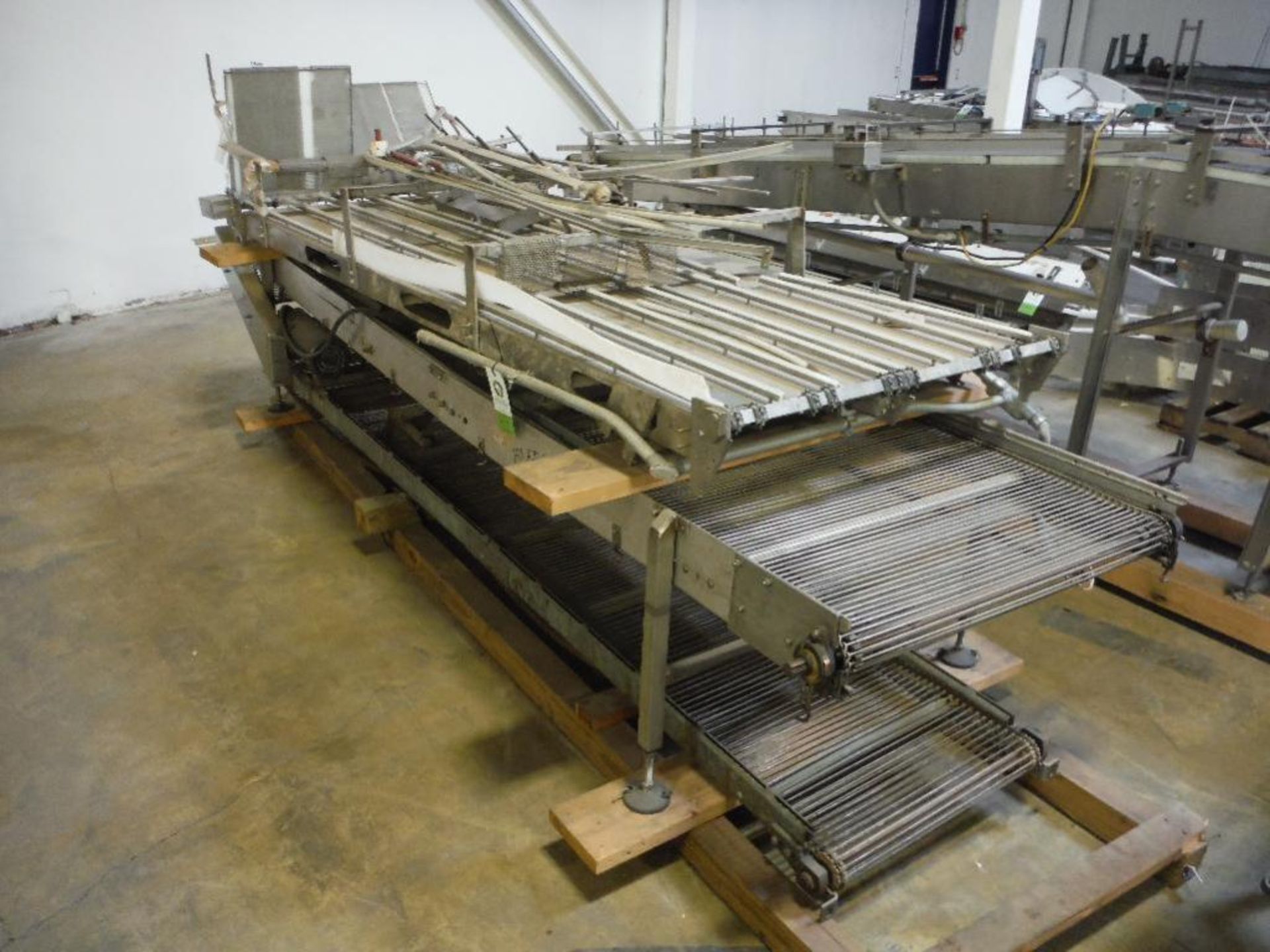 2 pieces of SS rod conveyor, 130 in. long x 24 in. wide, and 140 in. long x 36 in. wide ** Rigging F