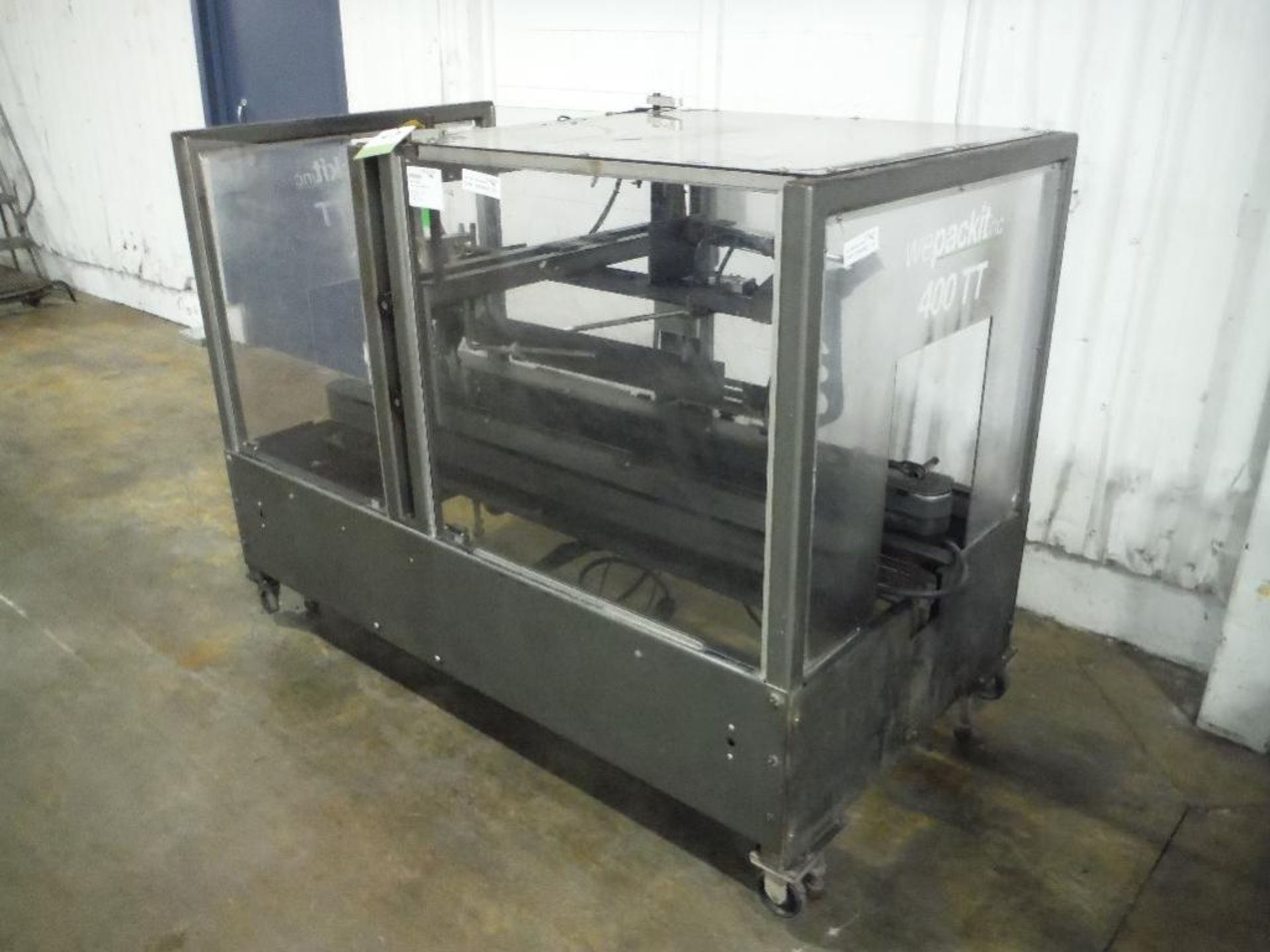 Wepackit case taper, Model 400TT72, SN 400TT-2843, top only, Interpack tape head, with tale tucker,