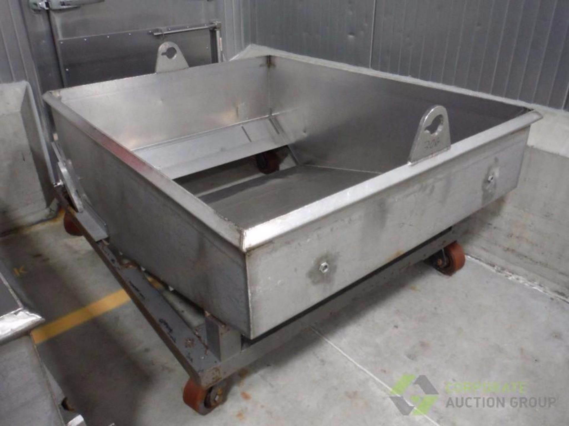 SS dough trough, 66 in. long x 52 in. wide, slant bottom with turn gate, mild steel frame on wheels