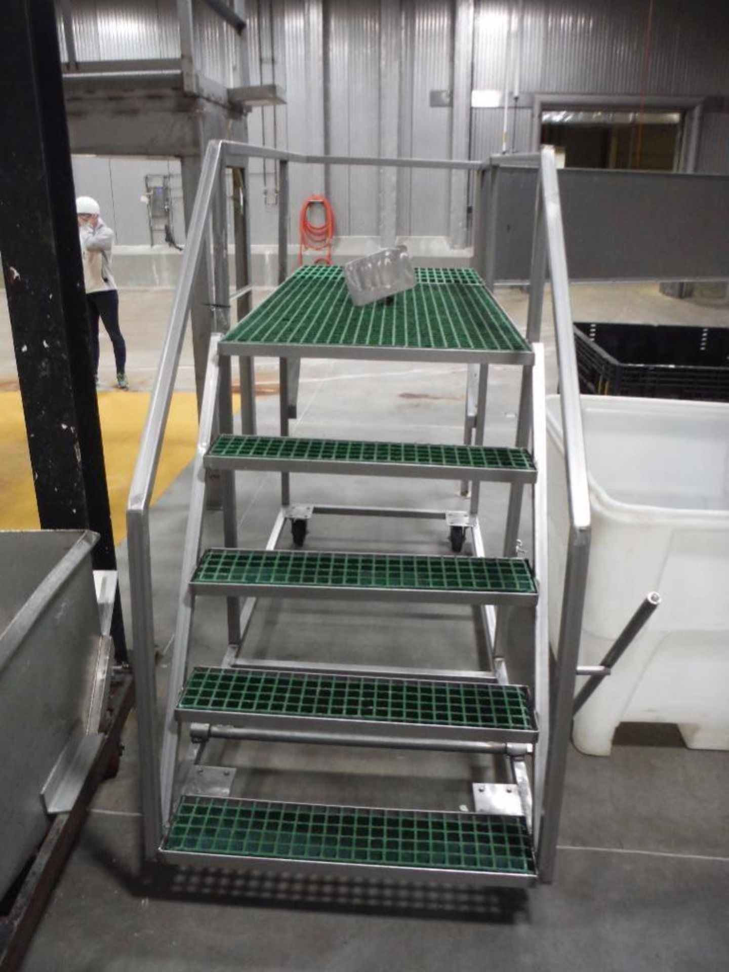 SS rolling platform, 84 in. long x 36 in. wide, 4 steps, poly decking ** Rigging Fee: $ 50** (Locate