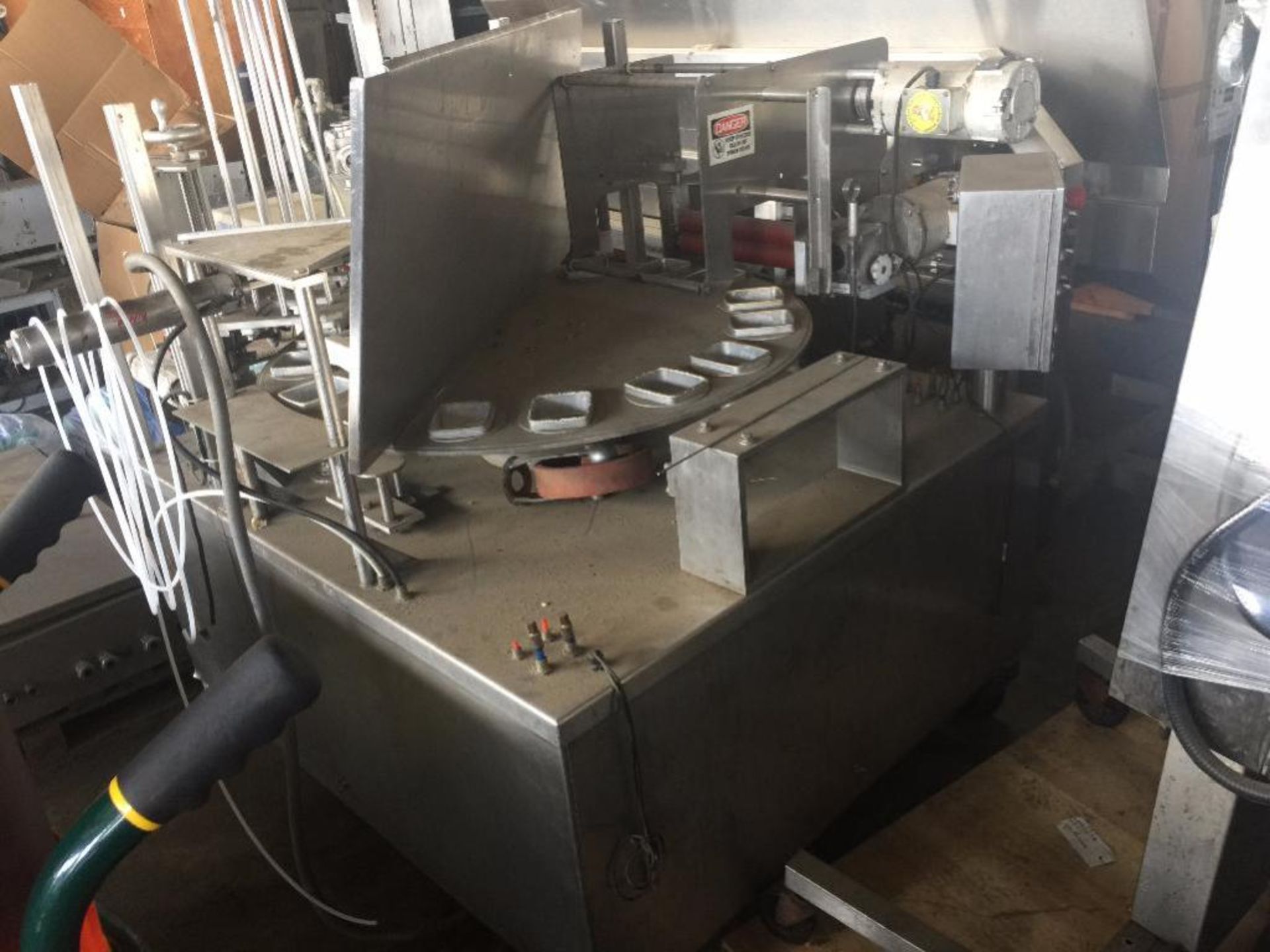 Rotary cup filler/sealer, 16 trays, 8 positions (incomplete) ** Rigging Fee: $ 350 ** (Located in: C