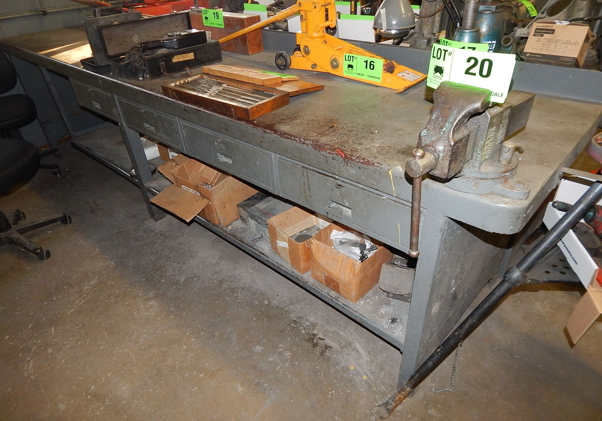 145" X 29" STEEL WORK BENCH WITH 4" VISE AND CONTENTS ON BOTTOM SHELF