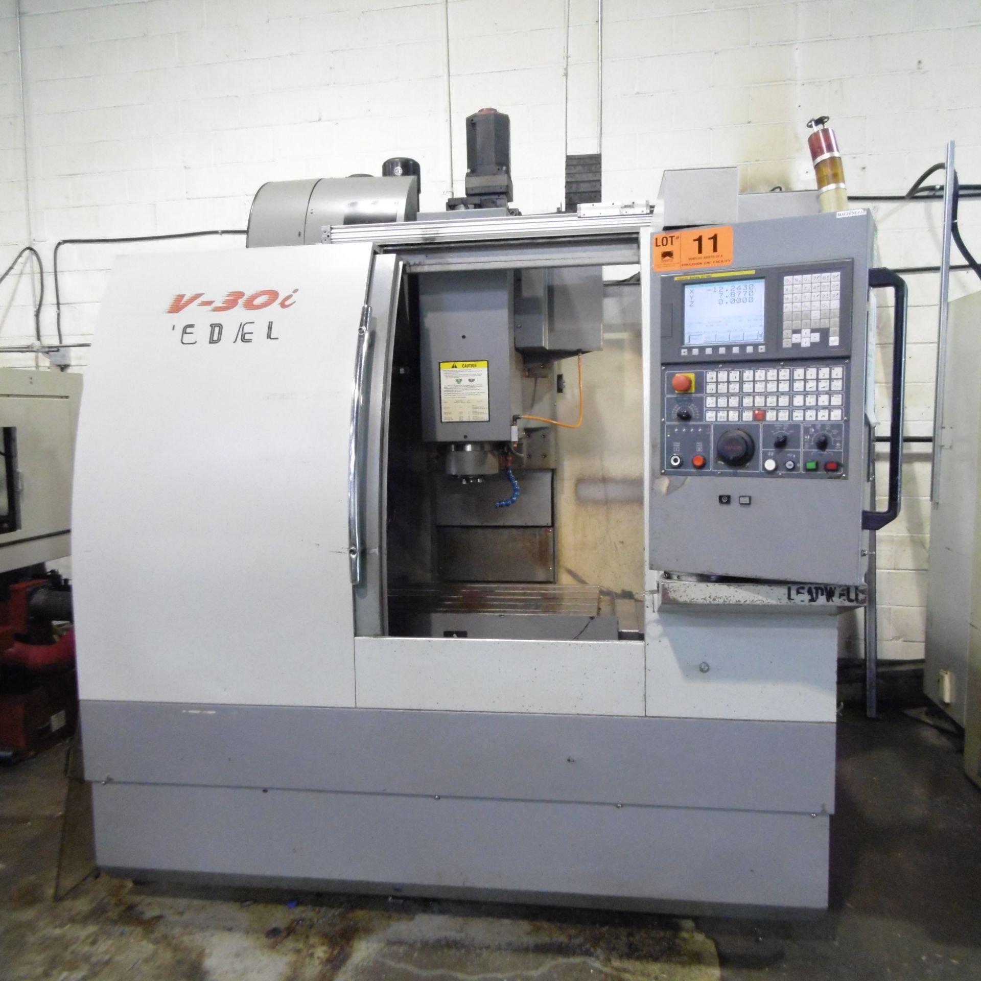 LEADWELL (2009) V-30I CNC VERTICAL MACHINING CENTER WITH FANUC OI-MC CNC CONTROL, TRAVELS X- 29.