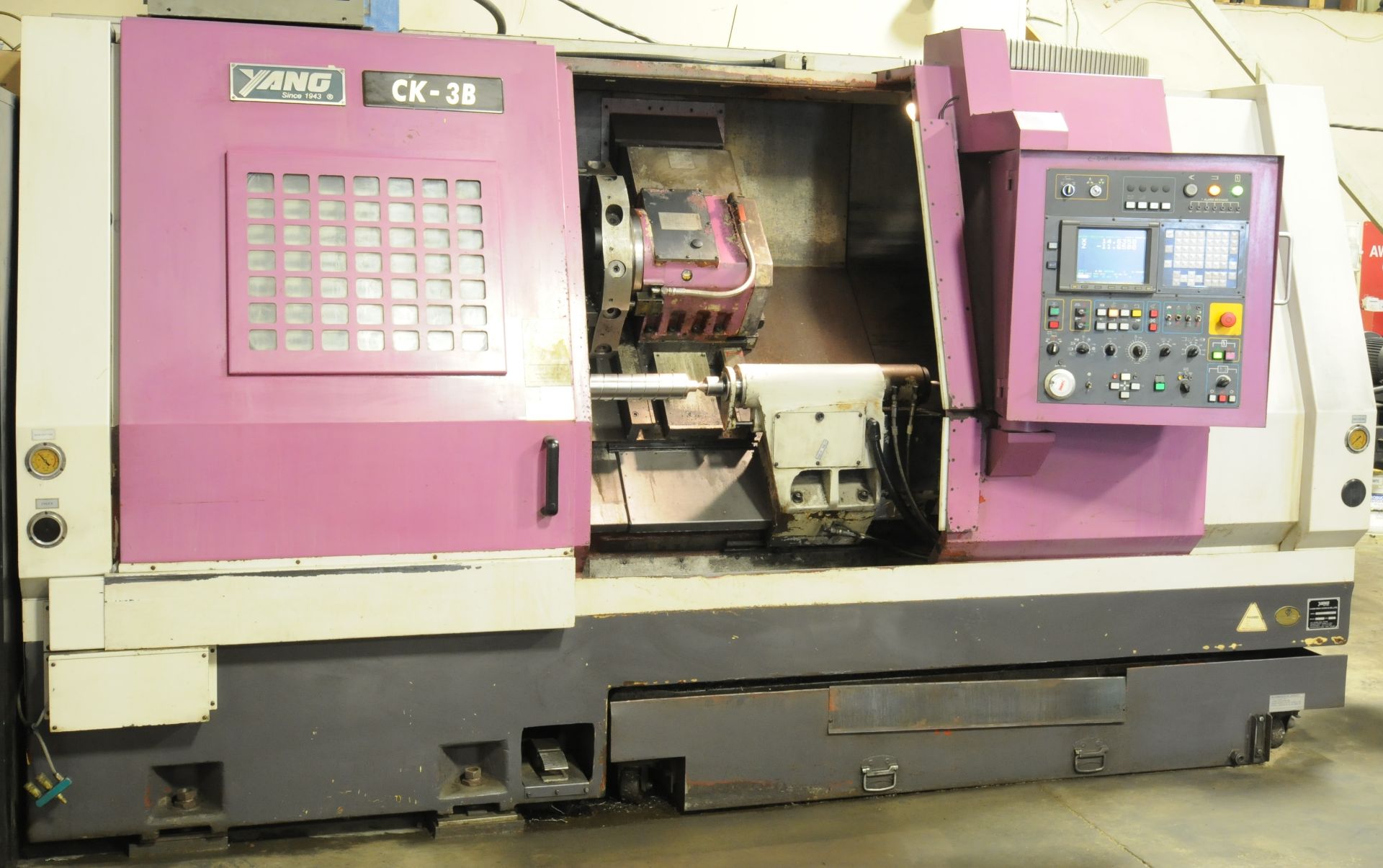 YANG (2000) CK-3B CNC TURNING CENTER WITH FANUC CNC CONTROL, 12" CHUCK, 26" SWING OVER BED, 15" MAX.