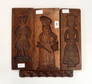 Three carved wooden plaques, intaglio carved, possibly chocolate moulds,