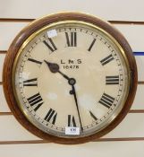 Railway wall clock, the circular painted dial inscribed "LMS 16478",