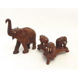 Collection of carved hardwood elephant ornaments