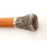 Malacca cane with Indian white metal mounts depicting figures in a village setting