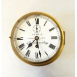 Brass ship's bulkhead clock by "Sewill, Liverpool and London, by appointment to the Admiralty",