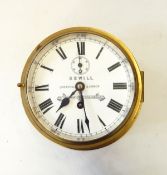 Brass ship's bulkhead clock by "Sewill, Liverpool and London, by appointment to the Admiralty",