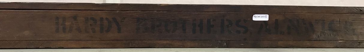 Hardy stained pine travelling box for fishing rods, stamped Hardy Brother,