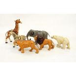 Collection of 10 early 20th century papier mache animal models including a tiger, a giraffe,