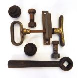 Brass LNWR carriage handle and other railway fittings including nuts and bolts,