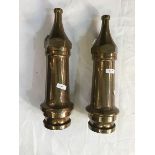 Two brass fire hose ends,