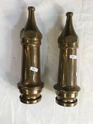 Two brass fire hose ends,