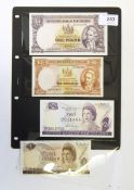 Four New Zealand banknotes, comprising one 10s note and one £1 note (both 1956-67,