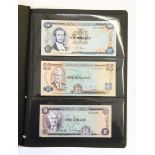 Six Jamaican banknotes including a 5s note, a 10s note and a £1 note (all 1960-1964) plus a 1d note,
