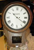Oak drop dial railway wall clock, the painted circular dial inscribed GWR,