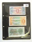 Three Maltese banknotes, comprising one 1s on 2s MD (1940), one 2s nd (1940) and one 1s MD (1940),