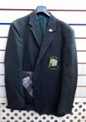Quantity of bus uniforms including a green jacket bearing a badge for the Circle-Line Bus Company